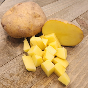 Organic Yellow Finn potato seed from SeedsNow-Potatoes, showing round, yellow-skinned late-season potato tubers.